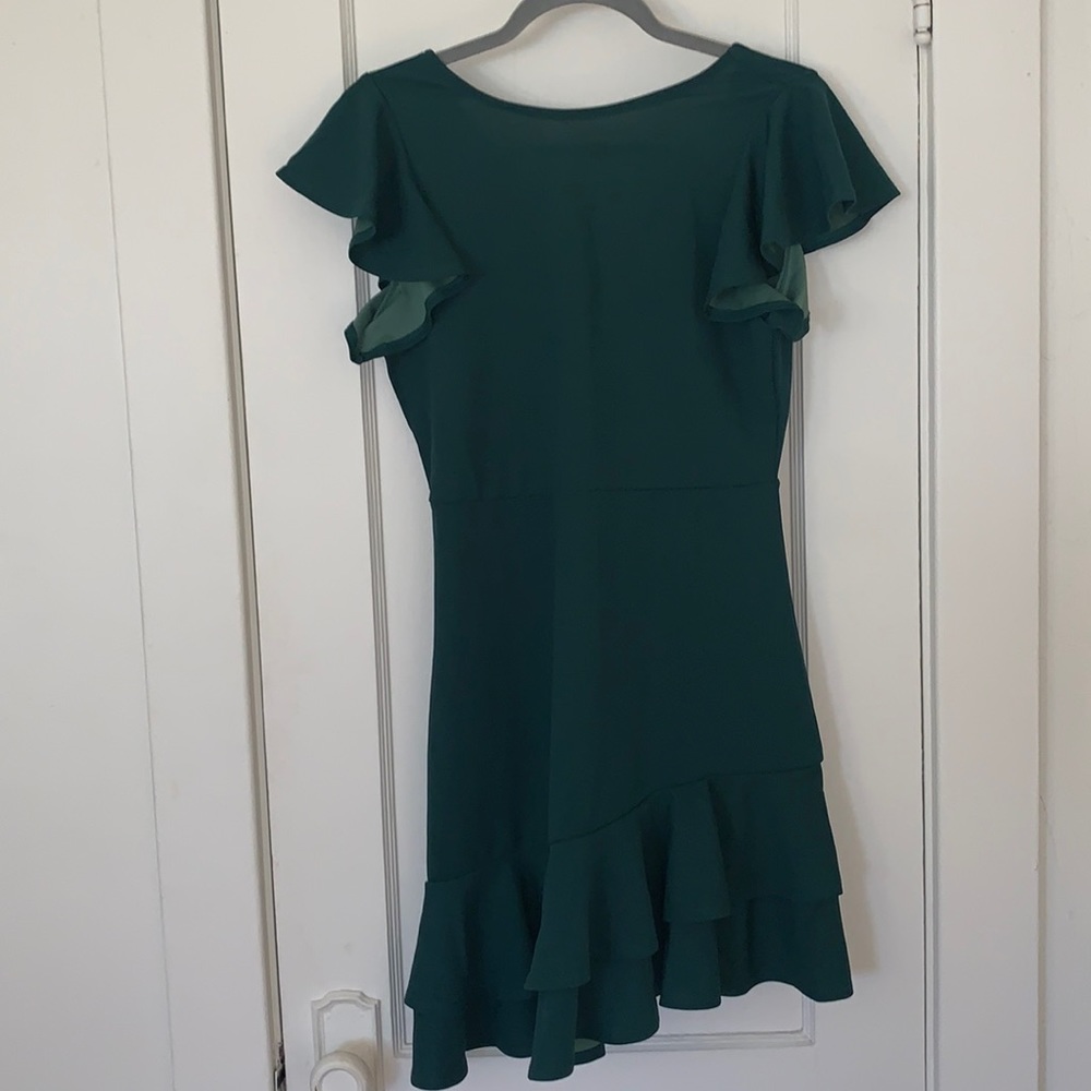 Emerald green asymmetrical flutter dress